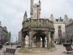 The Mercat Cross depicting the Stewart Monarchs